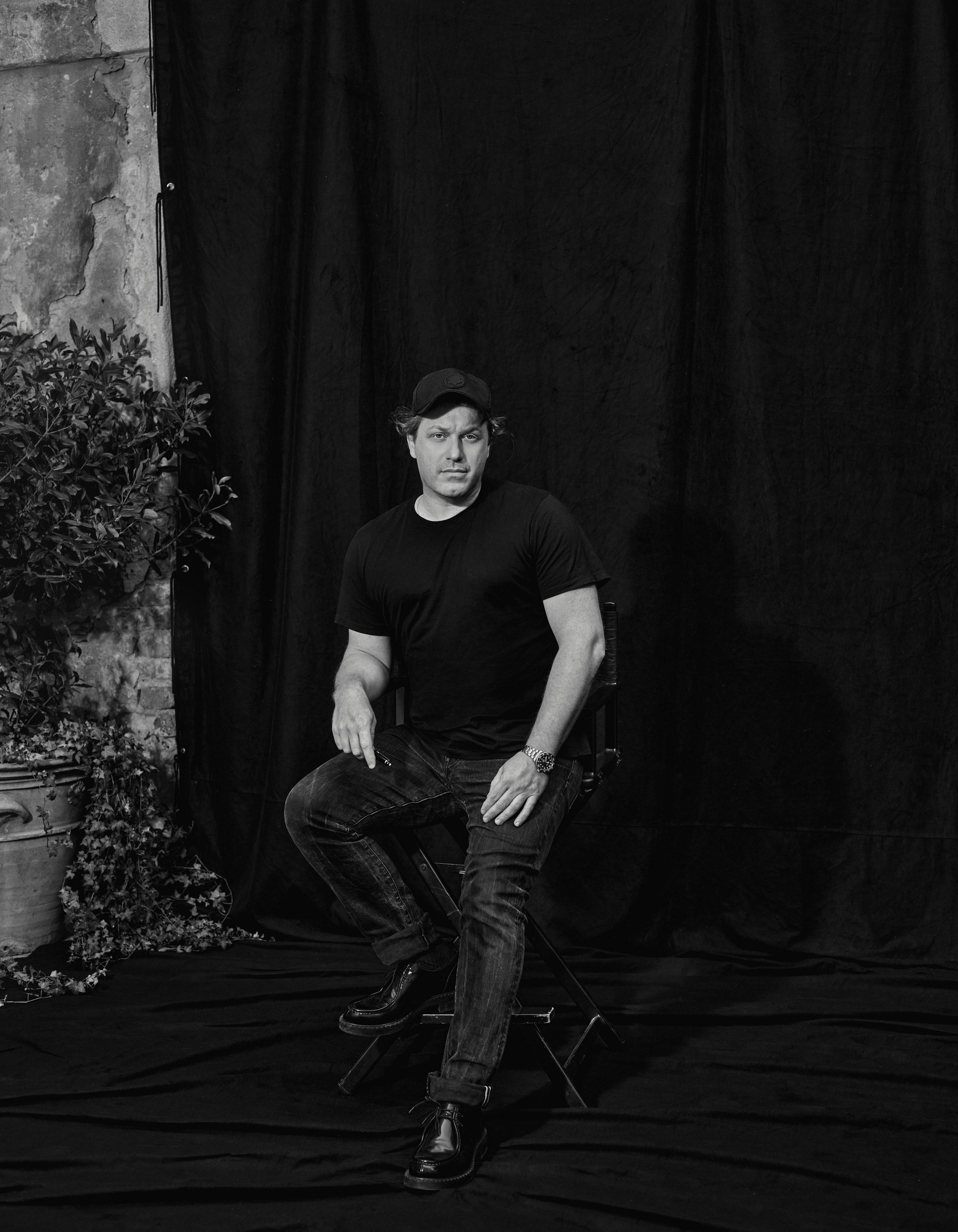 person photography portrait wristwatch pants sitting adult male man shoe