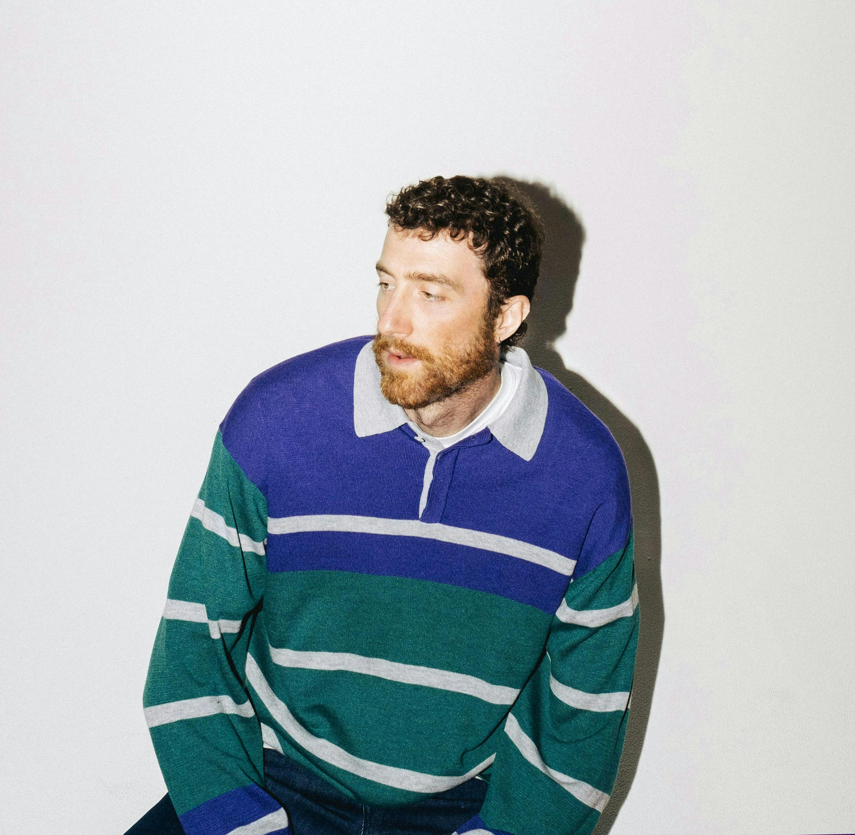 knitwear sweater face head person adult male man sweatshirt long sleeve