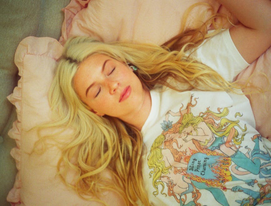 t-shirt cushion home decor person sleeping portrait adult female woman blonde