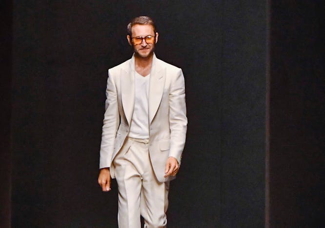 milan fashion adult male man person pants suit solo performance standing coat